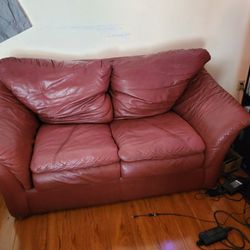 Red Leather (?) Couch Love Seat