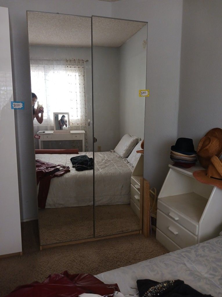 Storage Closet With Mirror Doors.
