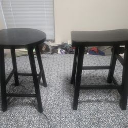 2  mismatched  Pier 1  Imports black wood  stools  $10  each  / $20 for both