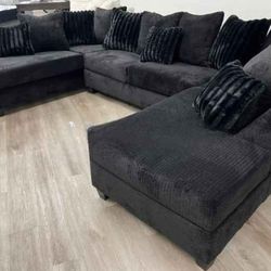 411 Black Fabric Sectional With Double Chaise . Brand New. 