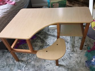 Preschool size desk with built in chair and shelf.