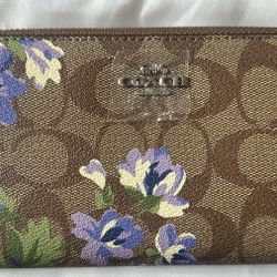 Coach Signature long wallet with Lily print