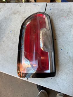 Gmc canyon left tail light Oem