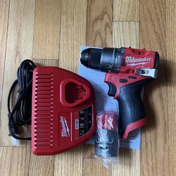 Milwaukee M12 Fuel 1/2” Hammer Drill/ Driver With 2.0ah Battery And Charger ( New)