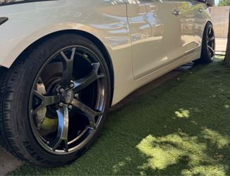 Nissan 370z nismo rays v1 with new continental tires 5x114 bolt pattern