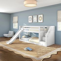 Bed with slide