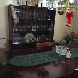 Antique dinner table and china cabinet