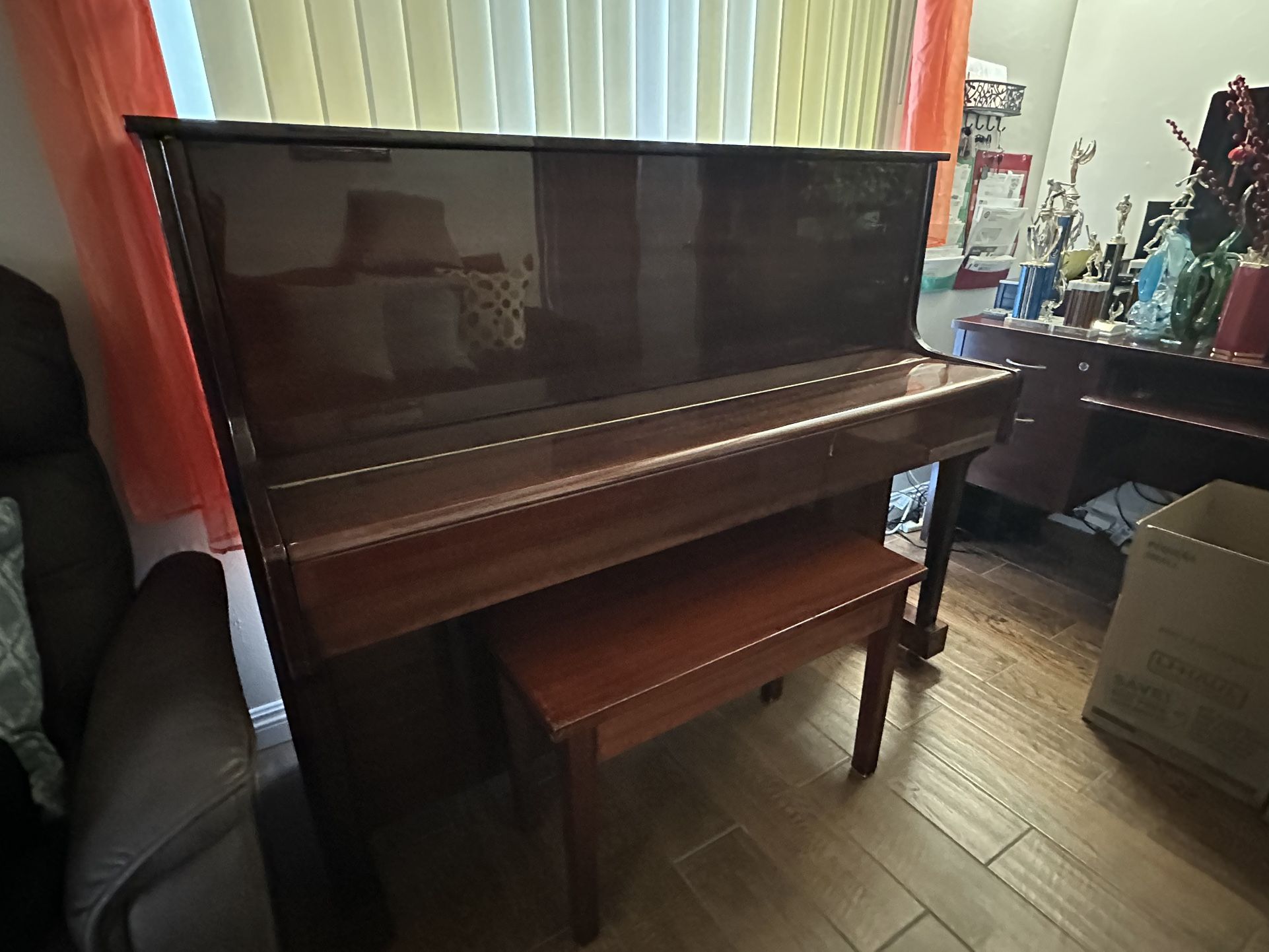 Polished cherry wood Schubert upright piano