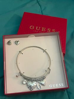 Guess charm bracelet/ earring set