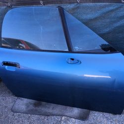 BMW Z3 passenger door, no mirror, no door panel, has window and regulator included,