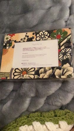 Japanese-style photo frame made from fabric featuring a traditional kimono pattern.