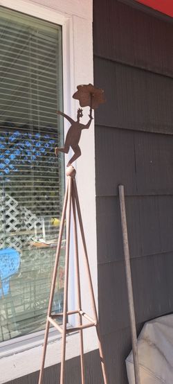 Large Metal Garden Trellis with Man with Umbrella