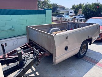 Trailer bed with bal hook hitch