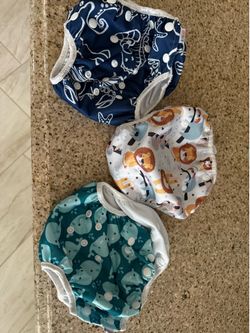 Infant swim diapers $8 for all 3