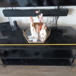 TV Stand, black smoked glass with 2 shelves. 