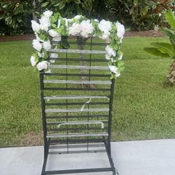 2 piece 7 feet Garden  square backdrop flowers and vines on wheels. Ideal for photos and displays. Needs slight knocking to separate. Pickup @  31705 