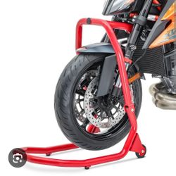 BRAND NEW IN BOX-Red Universal Front Wheel Motorcycle Stand. 