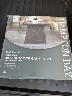 Hampton Bay outdoor gas firepit with lava rocks