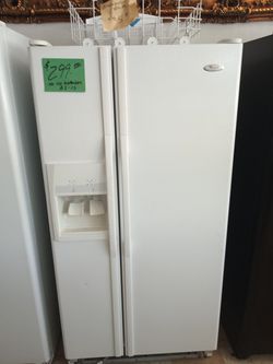 White side by side refrigerator whirlpool works great no ice as is . Warranty , Delivery available 2203 Fowler st. Ft. Myers 33901