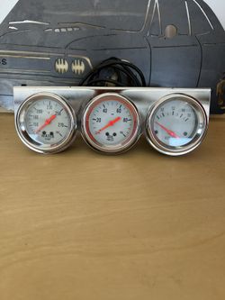 Aftermarket water oil and voltage meters a trio