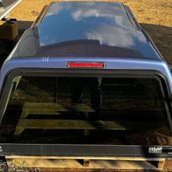     1996 Tacoma,     6'5X 5'1 Truck Camper Shell, It's A Soft Purple Color,
