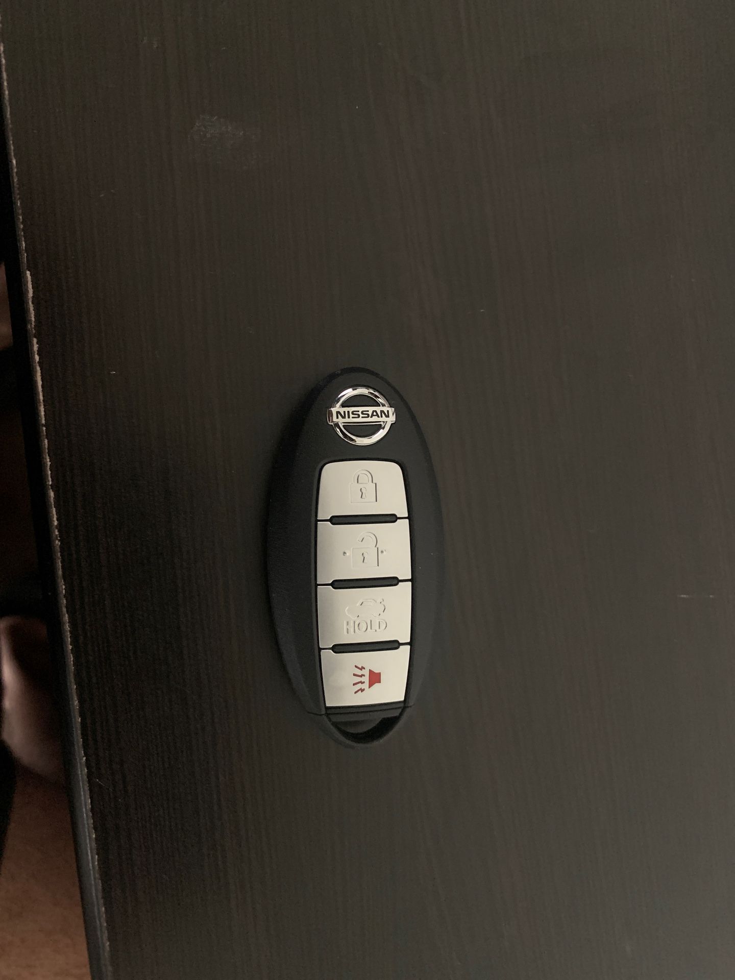 Original nissan key fob plus floor mate.