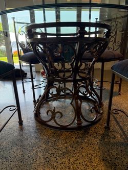 Handmade iron table set with 8 chairs