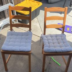 2 wooden dining room chairs and chair pads from IKEA 