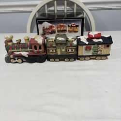 BRAND NEW PORCELAIN 3 PIECE LIGHTED TRAIN SET.  $50.00 DOLLARS. 