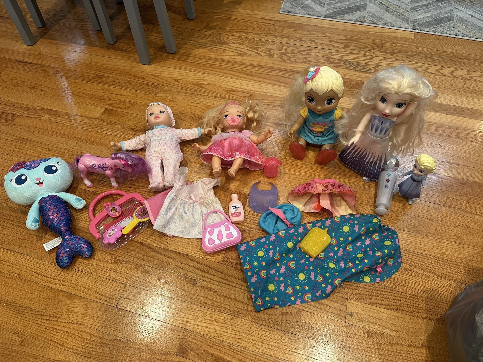 Assorted girls toys, Disney dolls Elsa and aurora, baby alive, gabby dollhouse