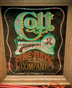 Colts Fire Arms Glass Sign