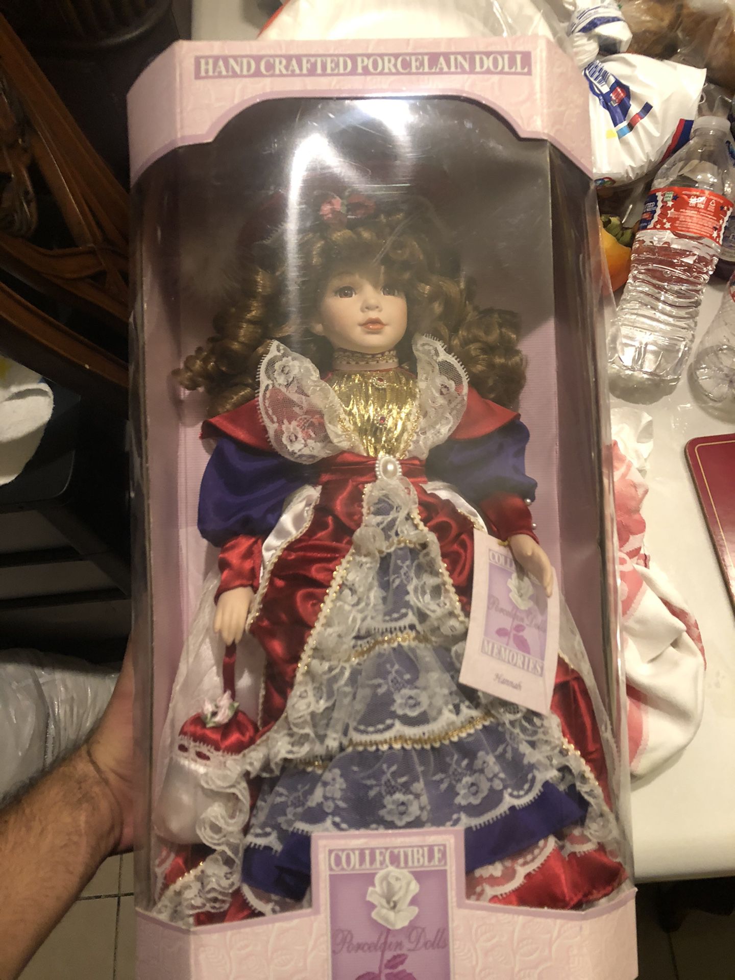 Antique porcelain doll USA color theme still in its package