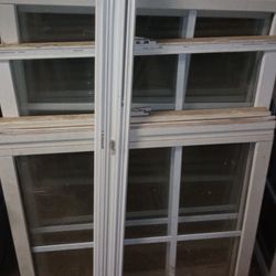 assortment of used windows wood frames
