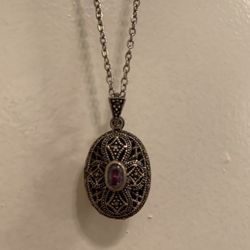 Marcasite & Silver Locket With Amythyest Stone In The Center. Chain Is 20” Long