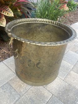 Metal Pot Decorative Design With Handles.
