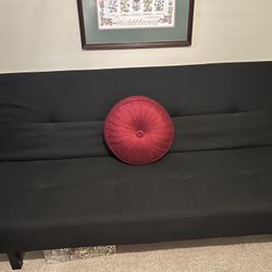 Black Futon w/red pillow