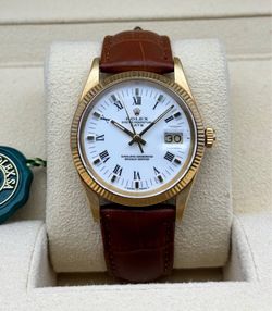 1981 Rolex Oyster Perpetual Date 15037 14k yellow gold 34mm light brown leather band factory skinny white Roman dial yellow gold fluted bezel watch bo