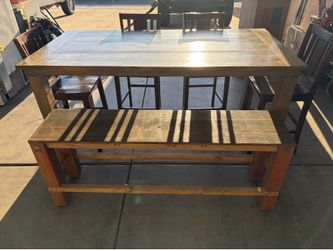 Dinning table and chairs and bench