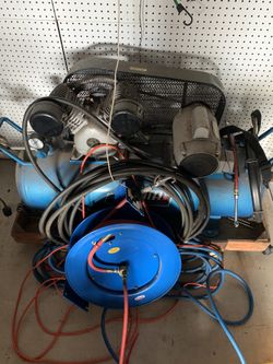 Puma air compressor with tons of hoses with mounts