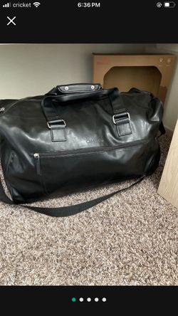 Mens black leather duffle bag, satin leather wallet, clothes