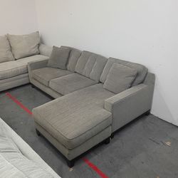 Small brown reversible Chase sectional