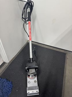 Pearl/Eddy floor scraper