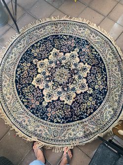 Oval tapestry rug