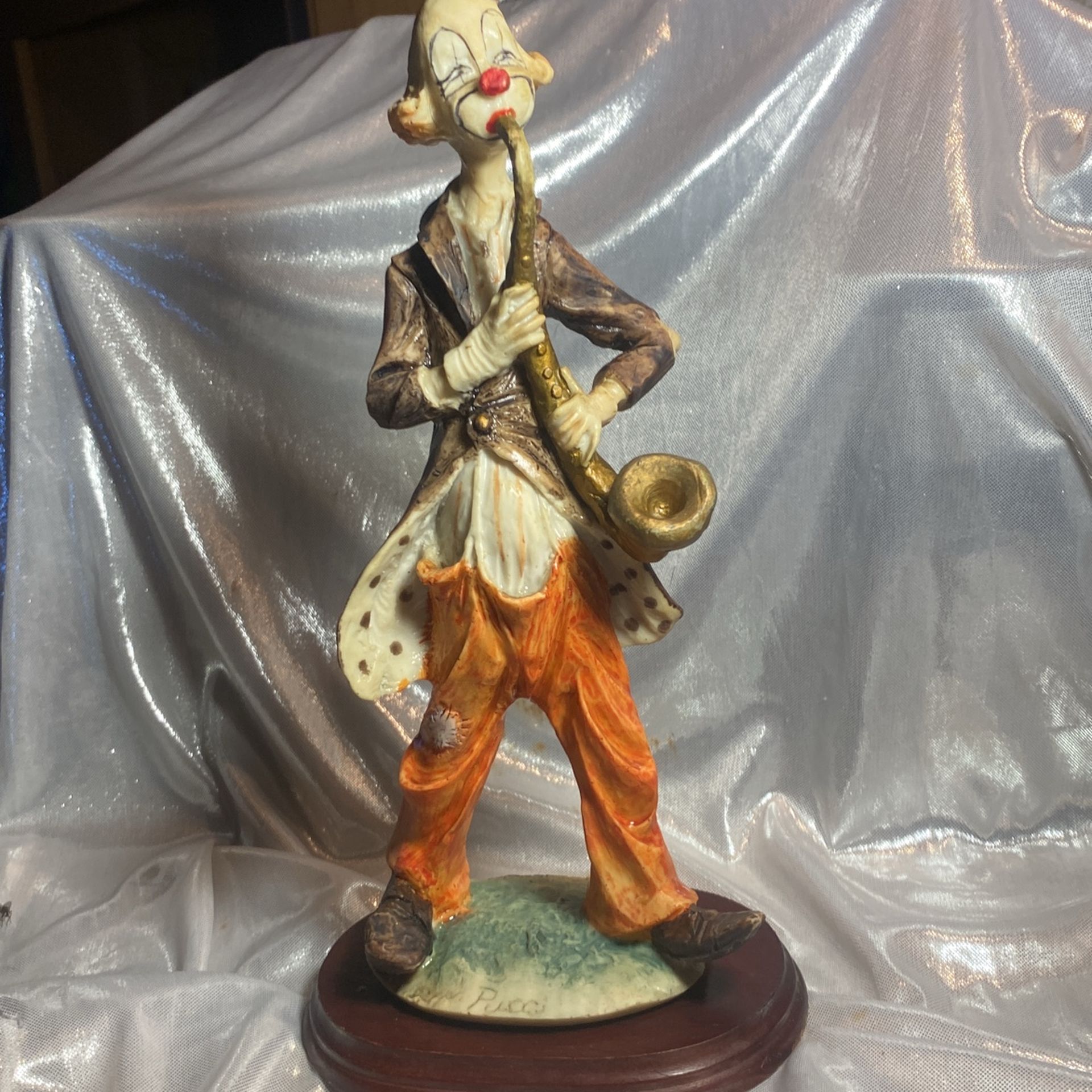 Vintage hobo clown with wooden base