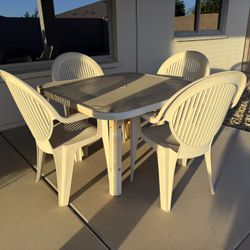 Table And 4 Chairs 