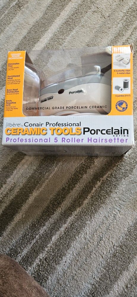 Ceramic rollers, dual voltage space saver with travel pouch,