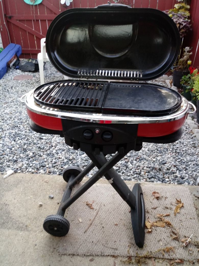 Portable grill,boat motor n battery,boat anchor