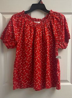 Brand new Ladies red floral puff sleeve tops sizes S & XXL $6.00 each