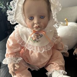 Vintage collectible porcelain baby doll by Marie Cohen (1991)