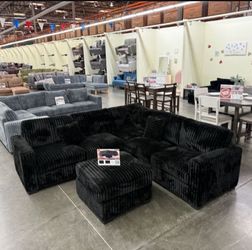 Black jumbo corduroy sectional sofa with 99x99 "